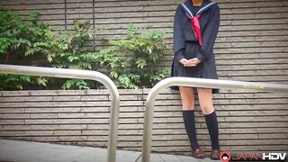 Fu Sazanami en uniforme exhibiendo su juego de calle